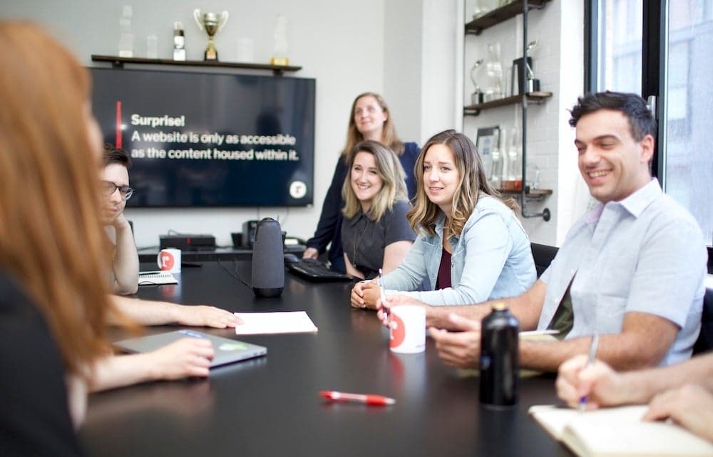 A group of Reason One staff having an accessibility meeting