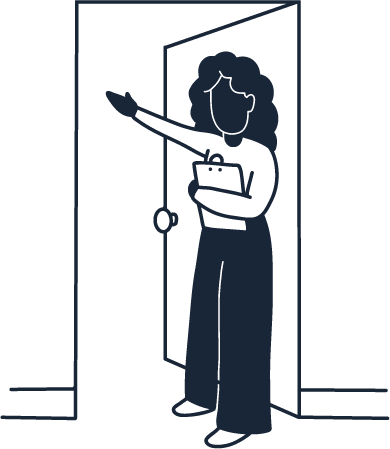 A woman holding a door open inviting patients back to be seen