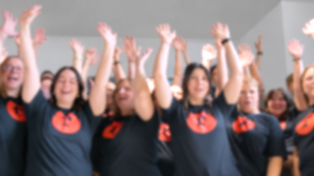 People with their hands raised